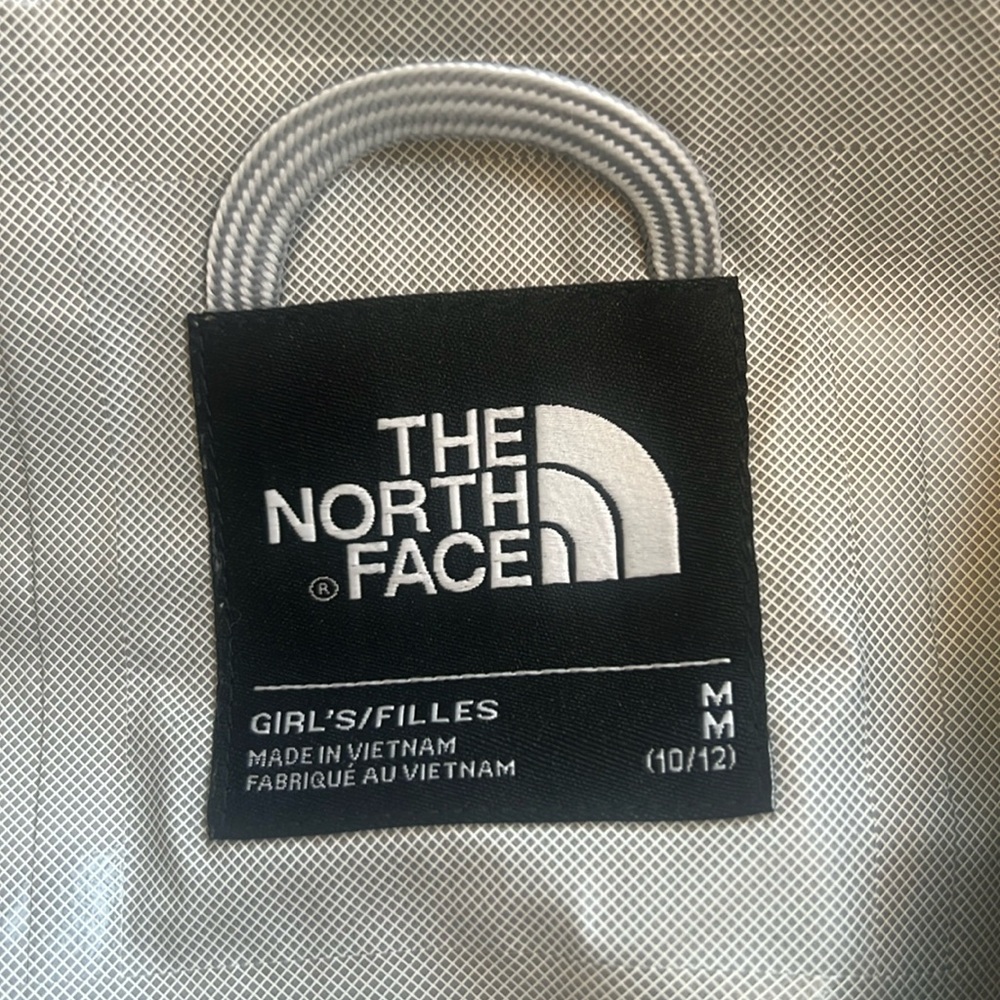 The North Face Girls Black and White Raincoat Label